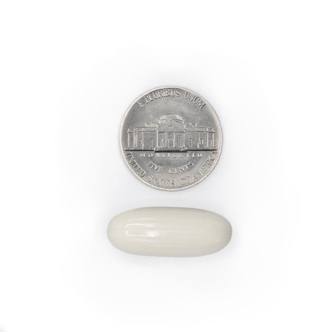 MagX3 white magnesium softgel size comparison with a five cent coin