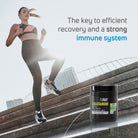 Athletic woman exercising with L-Glutamine 6000 mg powder for recovery and immune support.
