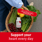 BenFit Maximum Omega 3 Fish Oil displayed with fresh produce, providing 1,360 mg of fish oil with EPA and DHA in one daily softgel.